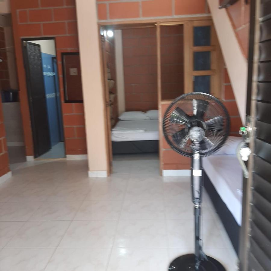 Mi Pueblo Natal Aptos Y Habitaciones Necocli Bagian luar foto