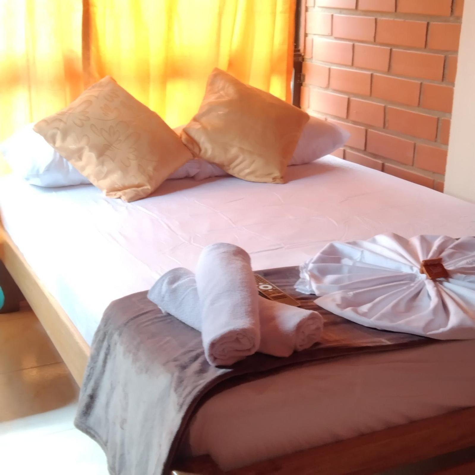 Mi Pueblo Natal Aptos Y Habitaciones Necocli Bagian luar foto